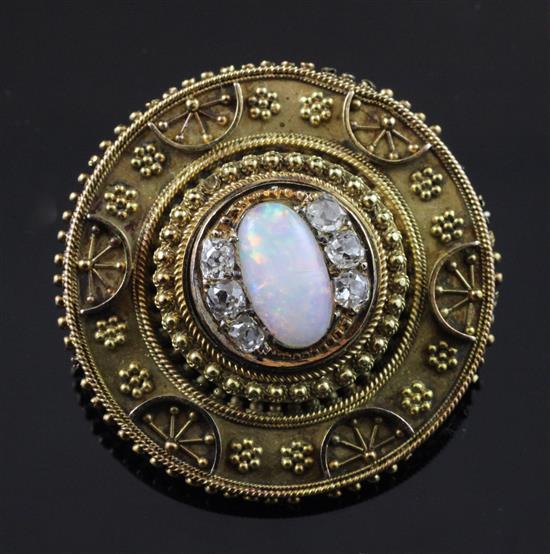 A Victorian gold, white opal and diamond set circular locket brooch, approx. 1.25in.